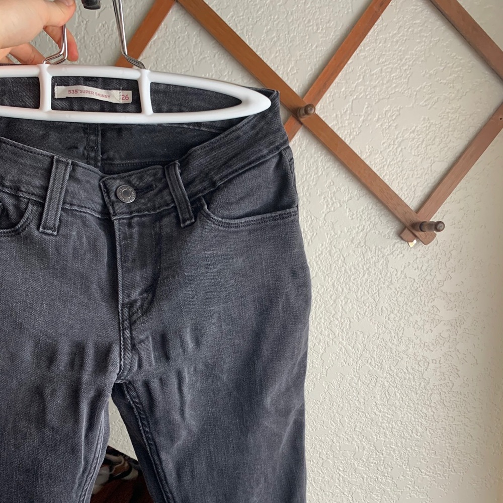 535 Levi ripped black “Super Skinny” jeans